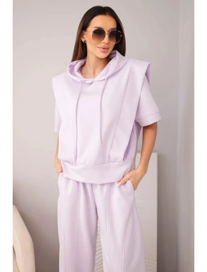 Dámský komplet model 22022727 mikina s kapucí a volné kalhoty se zavazováním světle fialová - K-Fashion Dámský komplet model 22022727 mikina s kapucí a volné kalhoty se zavazováním světle fialová - K-Fashion