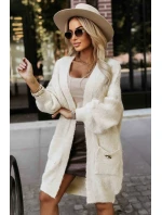 Módní oversize svetr s ozdobnou broží a kapsami béžový model 21322456 - numoco basic