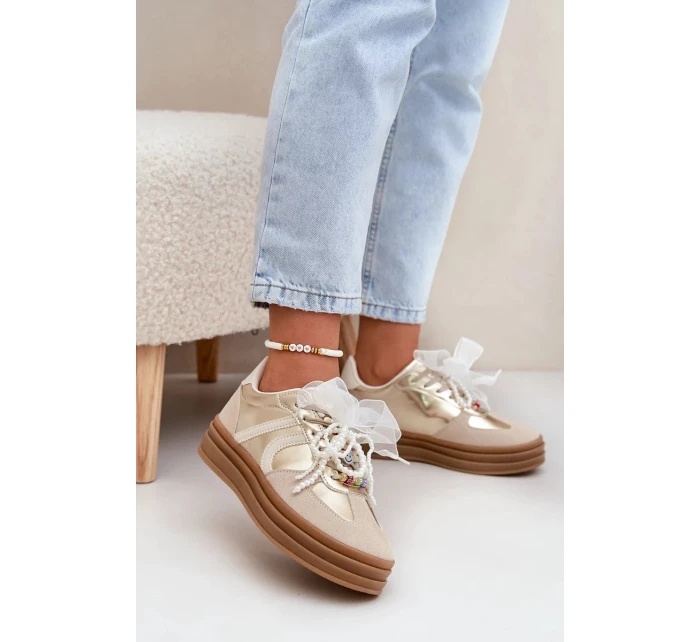 Dámské tenisky na platformě s ozdobami – béžovo-zlaté Vinness Dámské tenisky na platformě s ozdobami – béžovo-zlaté Vinness