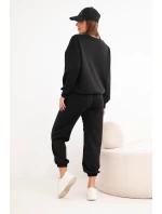 Dámská souprava model 21921202 s výřezem ve tvaru srdce černý - K-Fashion Dámská souprava model 21921202 s výřezem ve tvaru srdce černý - K-Fashion