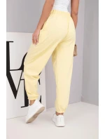 Dámské bavlněné kalhoty s vysokým pasem a ozdobným knoflíkem žluté