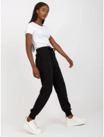 B 005 tepláky.11X černá