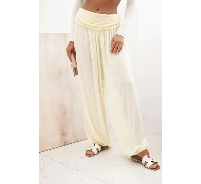 Dámské viskózové kalhoty s širokými nohavicemi a volánky žlutý