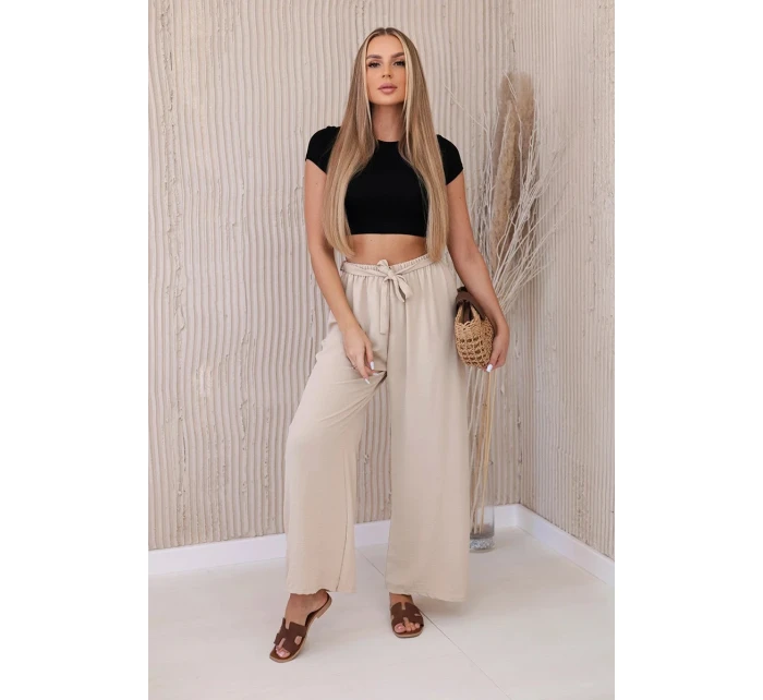 Kalhoty s širokým pasem beżowy