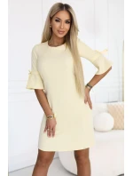 Dámské trapézové šaty s vázáním na rukávech pastelově žluté model 22022940 - numoco