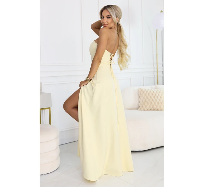 maxi šaty s rozparkem a zavazováním na zádech žluté model 22064816 - numoco maxi šaty s rozparkem a zavazováním na zádech žluté model 22064816 - numoco
