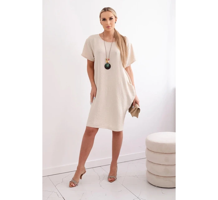 Šaty s kapsami a přívěskem tmavě béžová