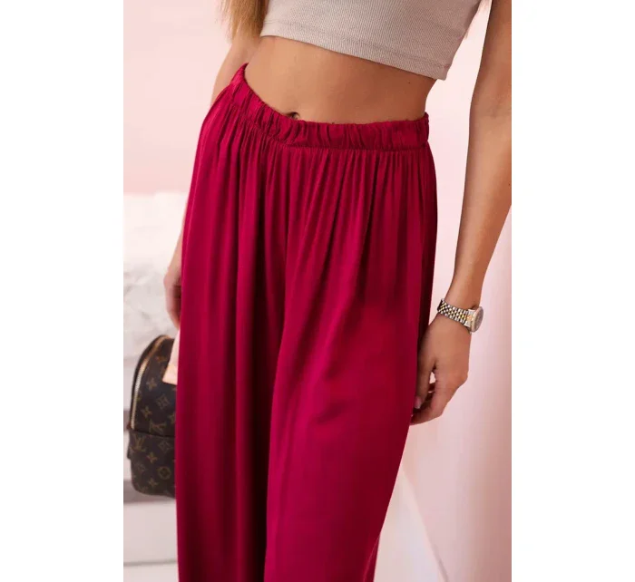Široké dámské kalhoty s elastickým pasem tmavě vínová