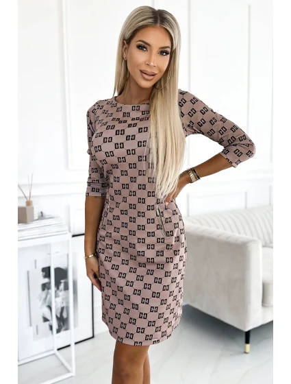 Béžové dámské šaty s černým vzorem a se zlatými zipy model 18910592 - numoco Béžové dámské šaty s černým vzorem a se zlatými zipy model 18910592 - numoco