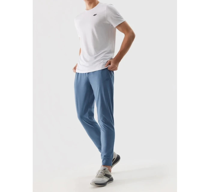 Pánské sportovní rychleschnoucí kalhoty 4F - denim Pánské sportovní rychleschnoucí kalhoty 4F - denim