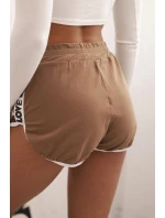 Dámské bavlněné šortky s elastickým pasem a sportovními lemy camelové Dámské bavlněné šortky s elastickým pasem a sportovními lemy camelové