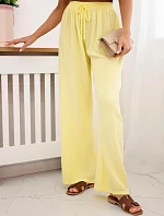 Mušelínové kalhoty se širokou nohavicí žlutý