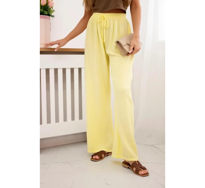 Mušelínové kalhoty se širokou nohavicí  žlutý