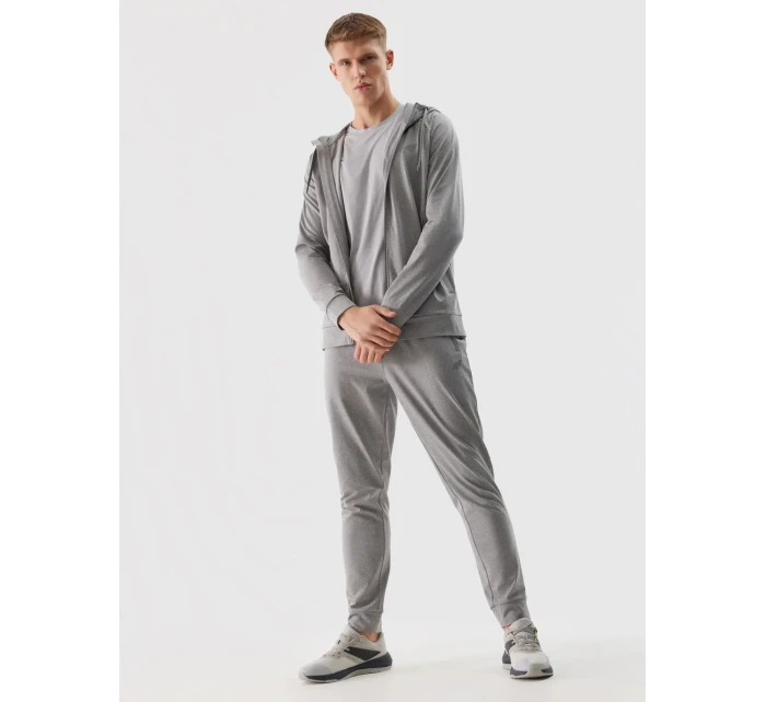 Pánské sportovní rychleschnoucí kalhoty 4F - chladné světle šedé Pánské sportovní rychleschnoucí kalhoty 4F - chladné světle šedé