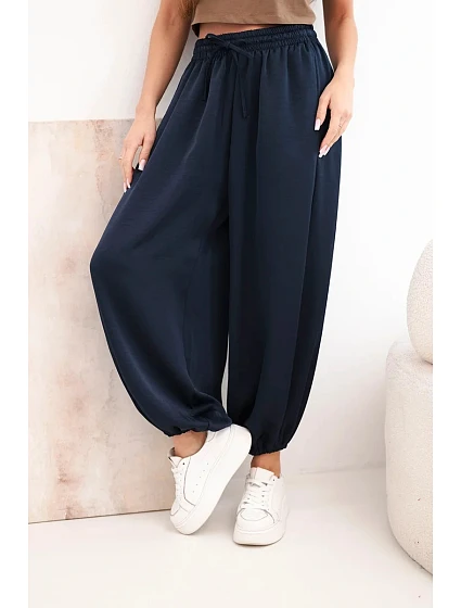 Dámské široké kalhoty s gumou v pase a vázáním typu model 22064417 - K-Fashion Dámské široké kalhoty s gumou v pase a vázáním typu model 22064417 - K-Fashion