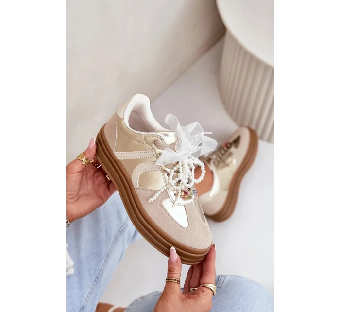 Dámské tenisky na platformě s ozdobami – béžovo-zlaté Vinness Dámské tenisky na platformě s ozdobami – béžovo-zlaté Vinness