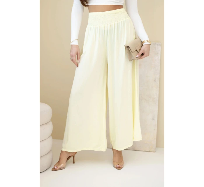 Dámské viskózové kalhoty s elastickým pasem žluté Dámské viskózové kalhoty s elastickým pasem žluté