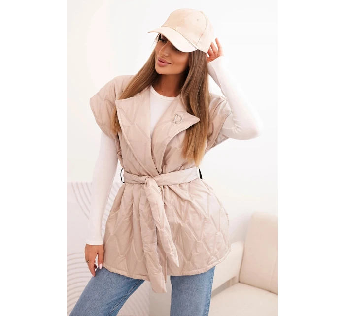 Dámská prošívaná vesta s páskem a širokým límcem béžová