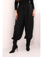 Dámské kalhoty s širokou nohavicí a zavazováním dole černé Dámské kalhoty s širokou nohavicí a zavazováním dole černé