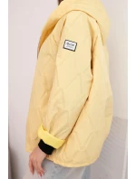 Dámská model 21791591 prošívaná bunda s kapucí a zipem žlutá - K-Fashion Dámská model 21791591 prošívaná bunda s kapucí a zipem žlutá - K-Fashion