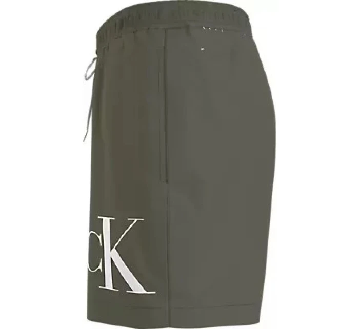 Pánské plavky MEDIUM DRAWSTRING KM0KM01003 LDY olivově zelené - Calvin Klein Pánské plavky MEDIUM DRAWSTRING KM0KM01003 LDY olivově zelené - Calvin Klein