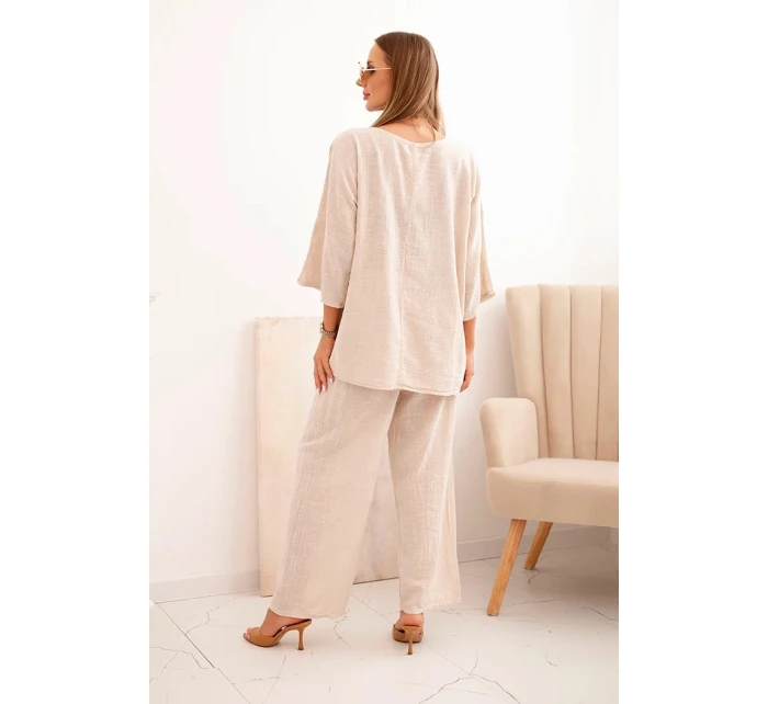 Dámský komplet z model 21193162 blůza s náhrdelníkem a kalhoty béžový - K-Fashion Dámský komplet z model 21193162 blůza s náhrdelníkem a kalhoty béžový - K-Fashion