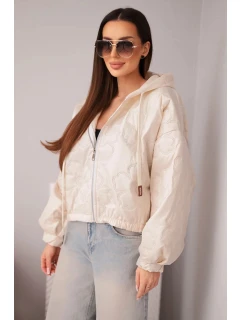 Dámská prošívaná bunda s kapucí a ozdobným květinovým ražením béžová