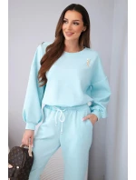 Dámský komplet máslová mikina s broží a kalhoty s rovnými nohavicemi model 22030082 - K-Fashion