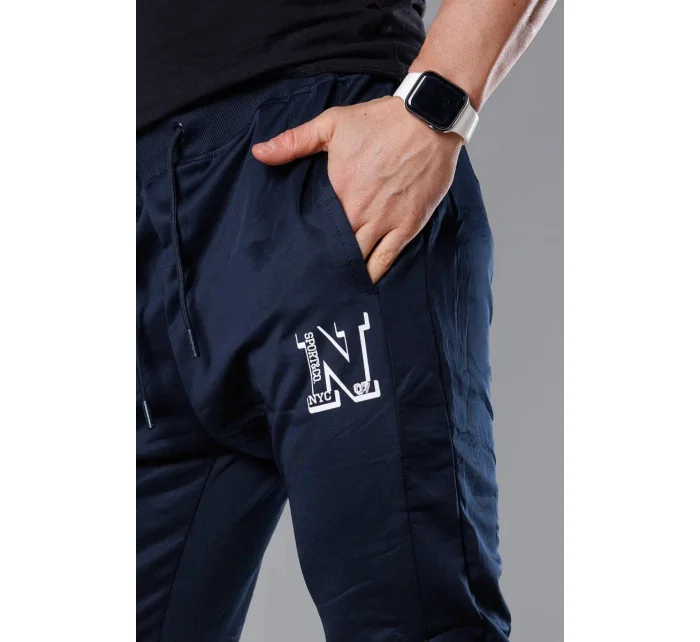 Tmavě modré pánské teplákové kalhoty s potiskem (8K178-25)