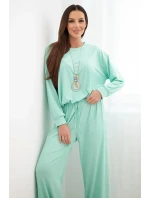 Dámský komplet z model 21951985 mikina s přívěskem a široké kalhoty mentolová - K-Fashion Dámský komplet z model 21951985 mikina s přívěskem a široké kalhoty mentolová - K-Fashion