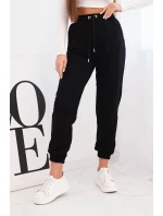 Dámské bavlněné kalhoty s gumou v pase černé Dámské bavlněné kalhoty s gumou v pase černé