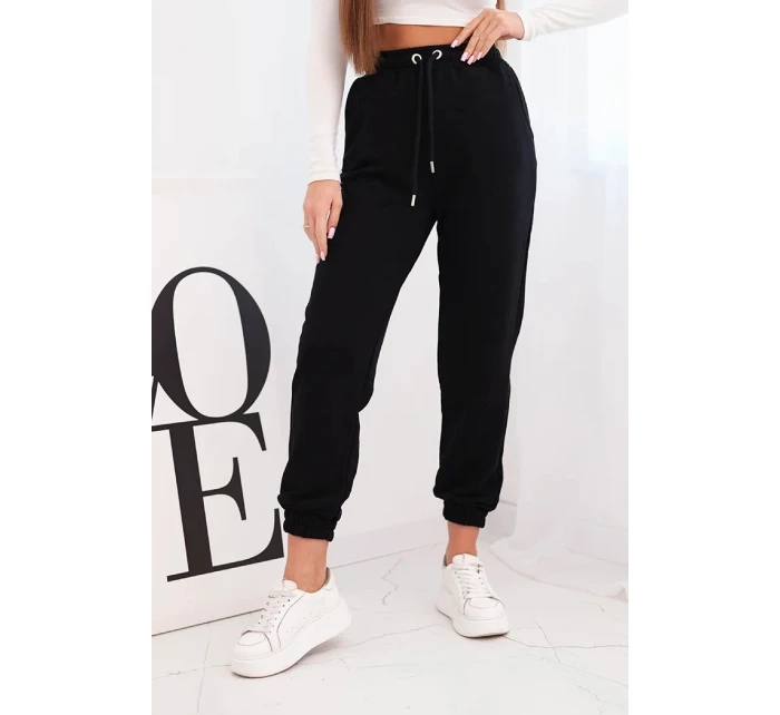 Dámské bavlněné kalhoty s gumou v pase černé Dámské bavlněné kalhoty s gumou v pase černé