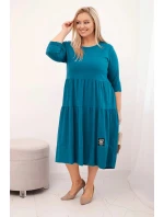 Dámská bavlněná model 21800789 Plus Size s volány a ohrnutým rukávem mořská - K-Fashion Dámská bavlněná model 21800789 Plus Size s volány a ohrnutým rukávem mořská - K-Fashion