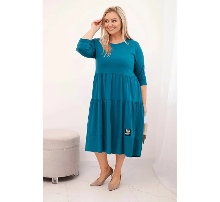 Dámská bavlněná model 21800789 Plus Size s volány a ohrnutým rukávem mořská - K-Fashion Dámská bavlněná model 21800789 Plus Size s volány a ohrnutým rukávem mořská - K-Fashion