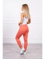 Tmavě meruňkové džínové kalhoty