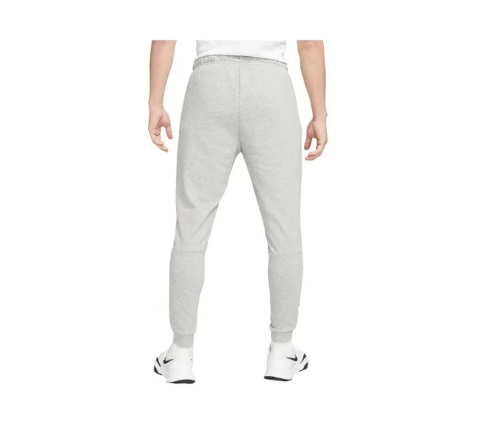 Pánské tréninkové kalhoty Dri-Fit Trapered M CZ6379-063 šedé - Nike Pánské tréninkové kalhoty Dri-Fit Trapered M CZ6379-063 šedé - Nike