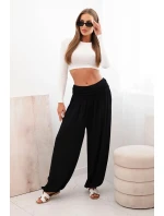 Dámské viskózové kalhoty s širokými nohavicemi a volánky černý