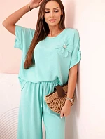 Dámský komplet z viskózy s ozdobným květem a širokými kalhotami - mátový