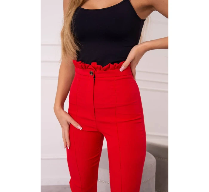 Červené plisované kalhoty