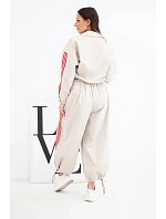 Dámská bavlněná souprava s oversized kalhotami a kontrastními lampasy béžová Dámská bavlněná souprava s oversized kalhotami a kontrastními lampasy béžová
