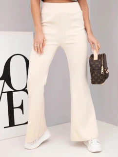 Dámské kalhoty máslo s rozšiřující se nohavicí béžové