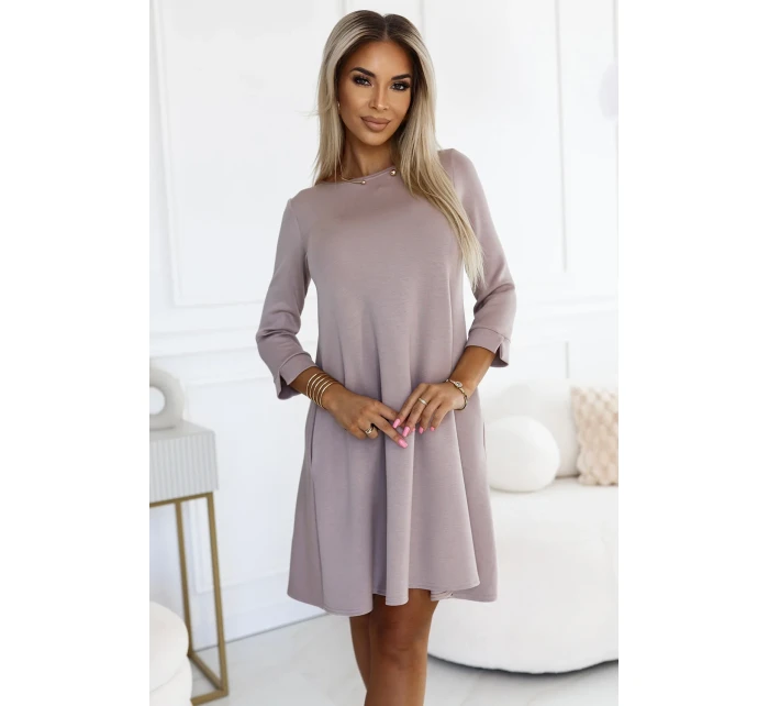 Béžové klasické trapézové dámské šaty s černým opaskem model 20698422 - numoco Béžové klasické trapézové dámské šaty s černým opaskem model 20698422 - numoco