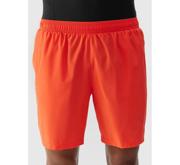 Pánské sportovní šortky z recyklovaných materiálů 4F - oranžové Pánské sportovní šortky z recyklovaných materiálů 4F - oranžové