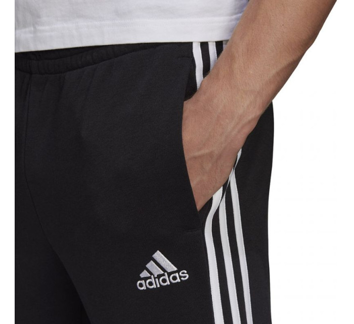 Pánské kalhoty Essentials Tapered Cuff 3 Stripes M GK8831 - Adidas