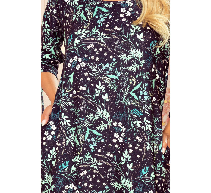 SOPHIE - Pohodlné dámské oversize šaty se vzorem listů v mátové barvě na tmavém pozadí 281-4