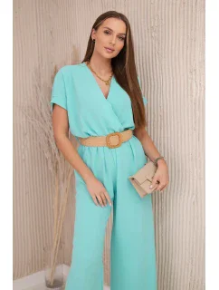 Kombinéza s ozdobným páskem v pase světle mátová