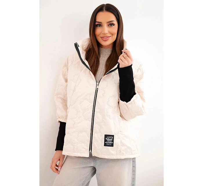Dámská jarní prošívaná bunda s ozdobnou model 22040178 a zipem světle béžová - K-Fashion
