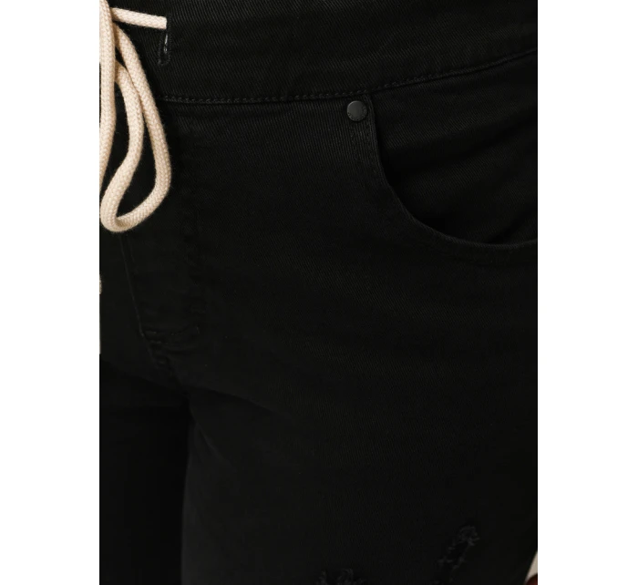 Černé dámské kalhoty FashionStreet s dírou UY2857 Černé dámské kalhoty FashionStreet s dírou UY2857