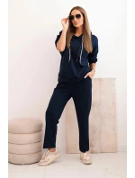 Komplet dámský máslový mikina s kapucí a kalhoty s páskem modrý Komplet dámský máslový mikina s kapucí a kalhoty s páskem modrý