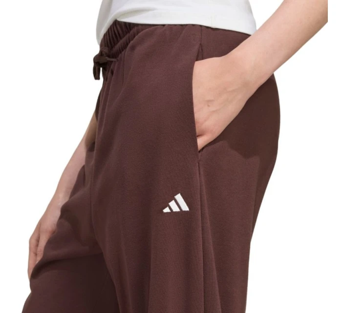 Dámské kalhoty adidas Essentials Small Logo French Terry Cuffed pants brown JX3864 dámské Dámské kalhoty adidas Essentials Small Logo French Terry Cuffed pants brown JX3864 dámské
